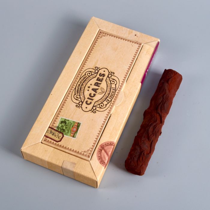 découvrez le cigare au chocolat, une gourmandise raffinée qui associe la saveur intense du chocolat à la forme originale d'un cigare. idéal pour offrir ou pour savourer lors d'occasions spéciales.